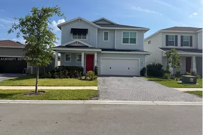 1664 Wandering Willow Way #1664, Loxahatchee, FL 33470 - Photo 3