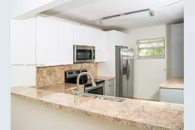 1100 NW 87th Ave #308, Coral Springs, FL 33071 - Photo 11