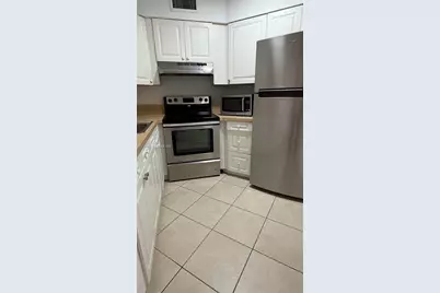 216 Lake Pointe Dr #223, Oakland Park, FL 33309 - Photo 3