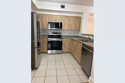 8000 N Nob Hill Rd #206, Tamarac, FL 33321 - Photo 9