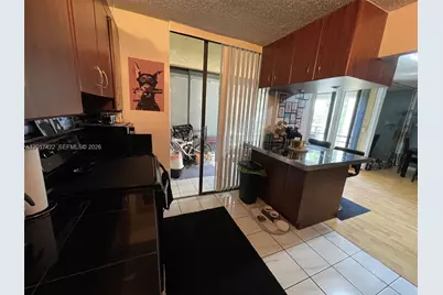 671 NE 195th St #207-E, Miami, FL 33179 - Photo 13