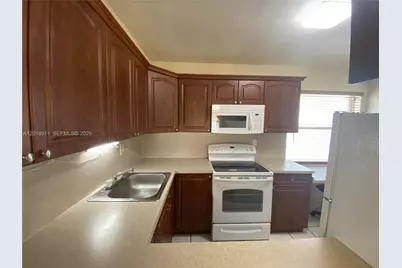 1590 W 46th St #117, Hialeah, FL 33012 - Photo 7