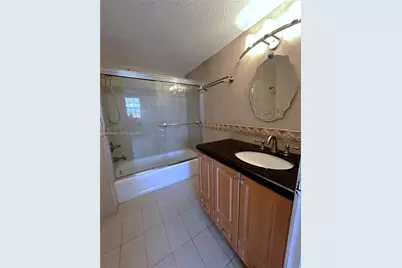 9715 Fontainebleau Blvd #E209, Miami, FL 33172 - Photo 15