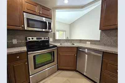 3457 NW 44th St #205, Oakland Park, FL 33309 - Photo 1