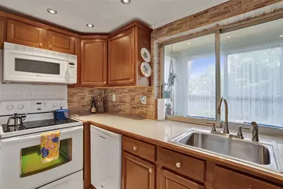 9070 Lime Bay Blvd #110, Tamarac, FL 33321 - Photo 21