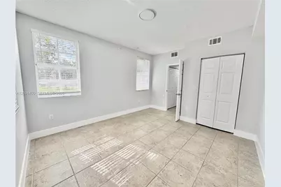 7940 N Nob Hill Rd #108, Tamarac, FL 33321 - Photo 13