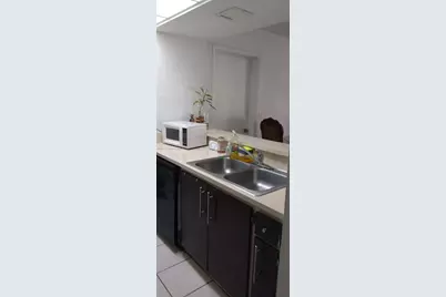 7075 NW 186th St #C207, Hialeah, FL 33015 - Photo 7