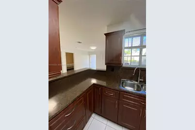 6763 NW 182nd St #105, Hialeah, FL 33015 - Photo 9