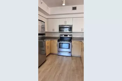 7930 N Nob Hill Rd #106, Tamarac, FL 33321 - Photo 3