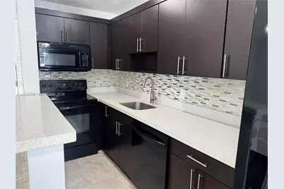 1860 Venice Park Dr #107, North Miami, FL 33181 - Photo 1