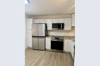 605 Ives Dairy Rd #306-7, Miami, FL 33179 - Photo 9