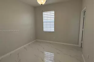 9135 Leatherwood Loop, Lehigh Acres, FL 33936 - Photo 29