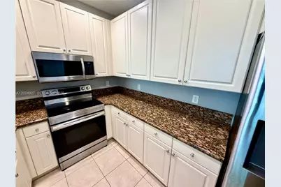 3909 White Peacock Ln, Coconut Creek, FL 33073 - Photo 11
