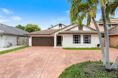 19080 NW 77th Ct, Hialeah, FL 33015 - Photo 1