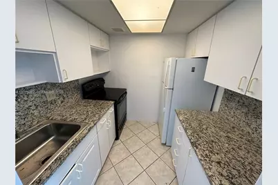 455 Golden Isles Dr #204, Hallandale Beach, FL 33009 - Photo 7