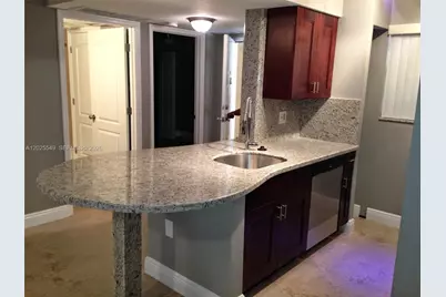 2850 N Oakland Forest Dr #112, Oakland Park, FL 33309 - Photo 1