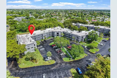 9091 Lime Bay Blvd #304, Tamarac, FL 33321 - Photo 1