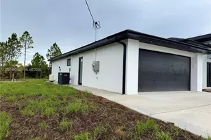 911 Cleveland Ave, Lehigh Acres, FL 33972 - Photo 9