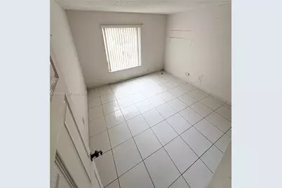 5201 NW 7th St #411, Miami, FL 33126 - Photo 9