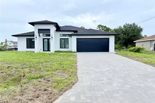 705 Colyer St E, Lehigh Acres, FL 33974 - Photo 1