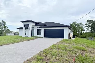 705 Colyer St E, Lehigh Acres, FL 33974 - Photo 3