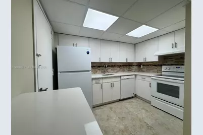 401 Golden Isles Dr #614, Hallandale Beach, FL 33009 - Photo 5