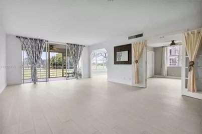 2651 S Course Dr #201, Pompano Beach, FL 33069 - Photo 1