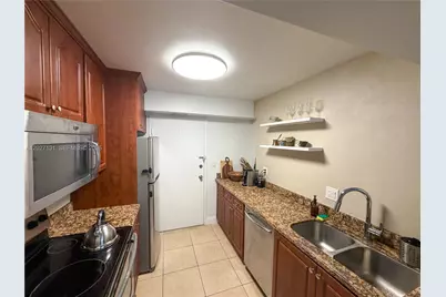 430 Golden Isles Dr #205, Hallandale Beach, FL 33009 - Photo 17