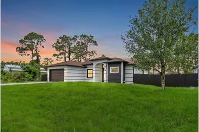 1047 E Merry St, Lehigh Acres, FL 33974 - Photo 1