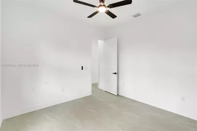 1047 E Merry St, Lehigh Acres, FL 33974 - Photo 27