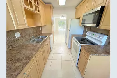 8450 Lagos De Campo Blvd #206, Tamarac, FL 33321 - Photo 1