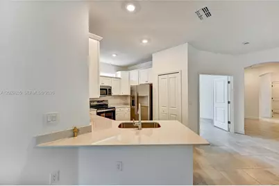 20545 Hazelnut Ct #., Lehigh Acres, FL 33936 - Photo 13