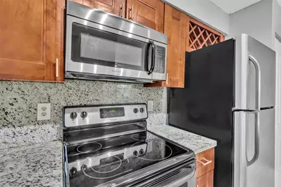 2851 N Oakland Forest Dr #111, Oakland Park, FL 33309 - Photo 3