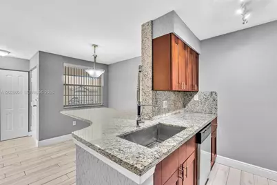 2851 N Oakland Forest Dr #111, Oakland Park, FL 33309 - Photo 5