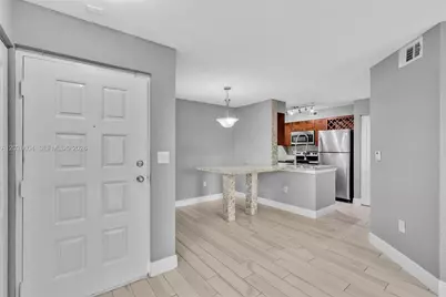 2851 N Oakland Forest Dr #111, Oakland Park, FL 33309 - Photo 1