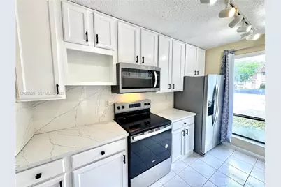 4240 NW 114th Ter #40, Coral Springs, FL 33065 - Photo 3