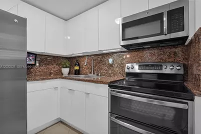6095 W 18th Ave #S107, Hialeah, FL 33012 - Photo 9