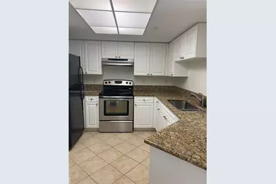 300 N Crestwood Ct N #310, Royal Palm Beach, FL 33411 - Photo 3