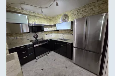 900 NE 195th St #215, Miami, FL 33179 - Photo 11
