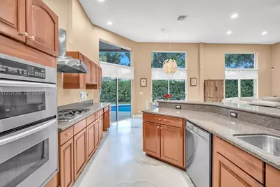 1776 W Eagle Trace Blvd W, Coral Springs, FL 33071 - Photo 17
