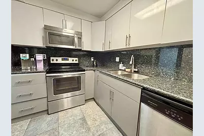 301 Golden Isles Dr #406, Hallandale Beach, FL 33009 - Photo 3