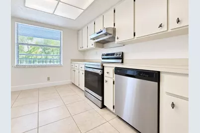 8982 W Sample Rd #204, Coral Springs, FL 33065 - Photo 7