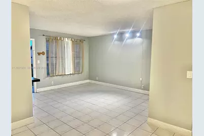 10002 Winding Lake Rd #203, Sunrise, FL 33351 - Photo 13