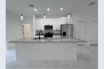 2706 72nd St W, Lehigh Acres, FL 33971 - Photo 5