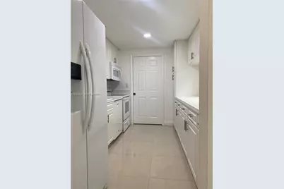 9805 NW 52nd St #207, Doral, FL 33178 - Photo 7