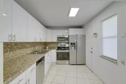 1351 NE 191st St #E117, Miami, FL 33179 - Photo 1