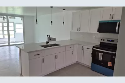 6050 NW 64th Ave #105, Tamarac, FL 33319 - Photo 1