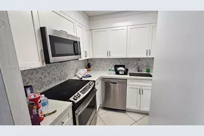 220 Kings Point Dr #105, Sunny Isles Beach, FL 33160 - Photo 9