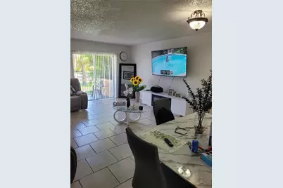 18101 NW 68th Ave #E105, Hialeah, FL 33015 - Photo 1
