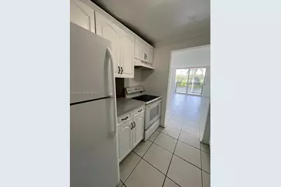 2075 NE 164th St #204, North Miami Beach, FL 33162 - Photo 1